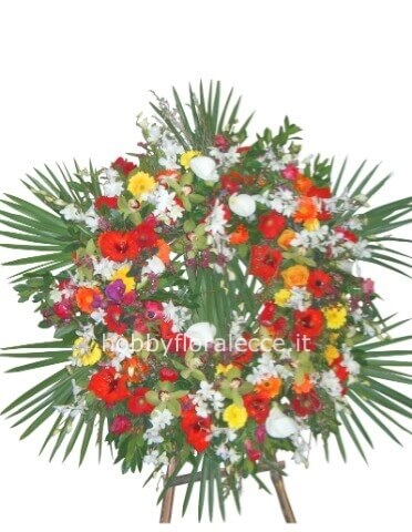 Cuscino funebre con fiori freschi assortiti, colorata.